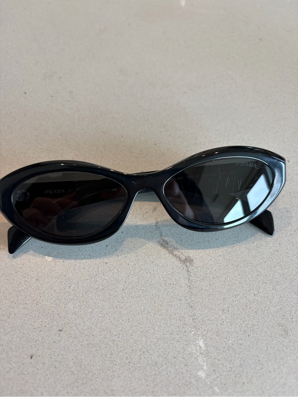 Prada Black Cat-Eye Sunglasses with Dark Lenses